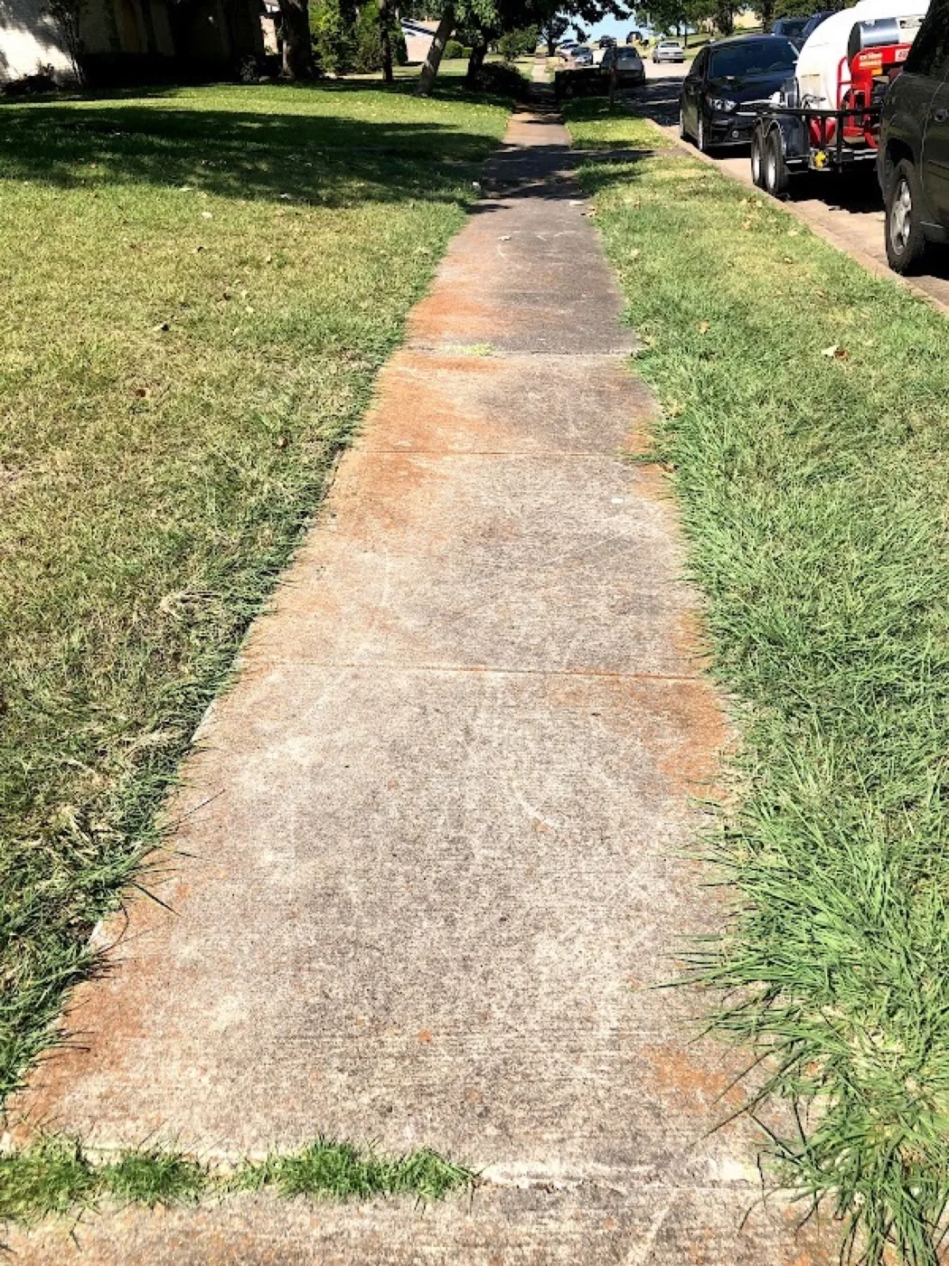 Concrete sidewalk before pressure washing